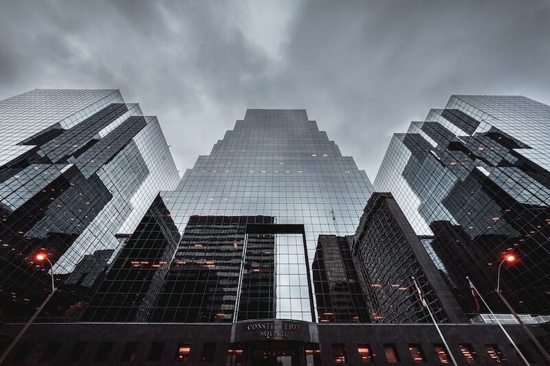 Modern Buildings with Reflections and Grey Sky
